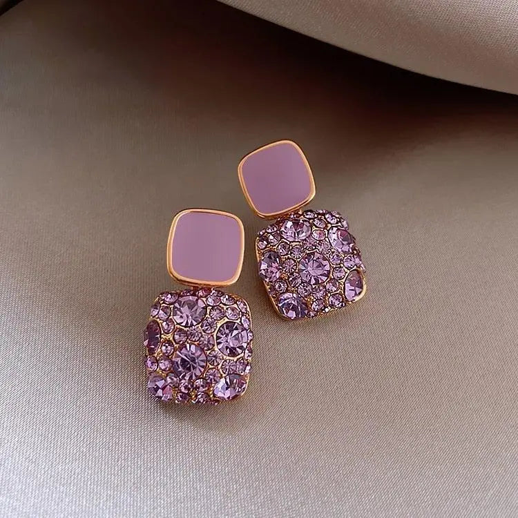 Luxurious purple earrings with zirconia inlay Unique Joyas