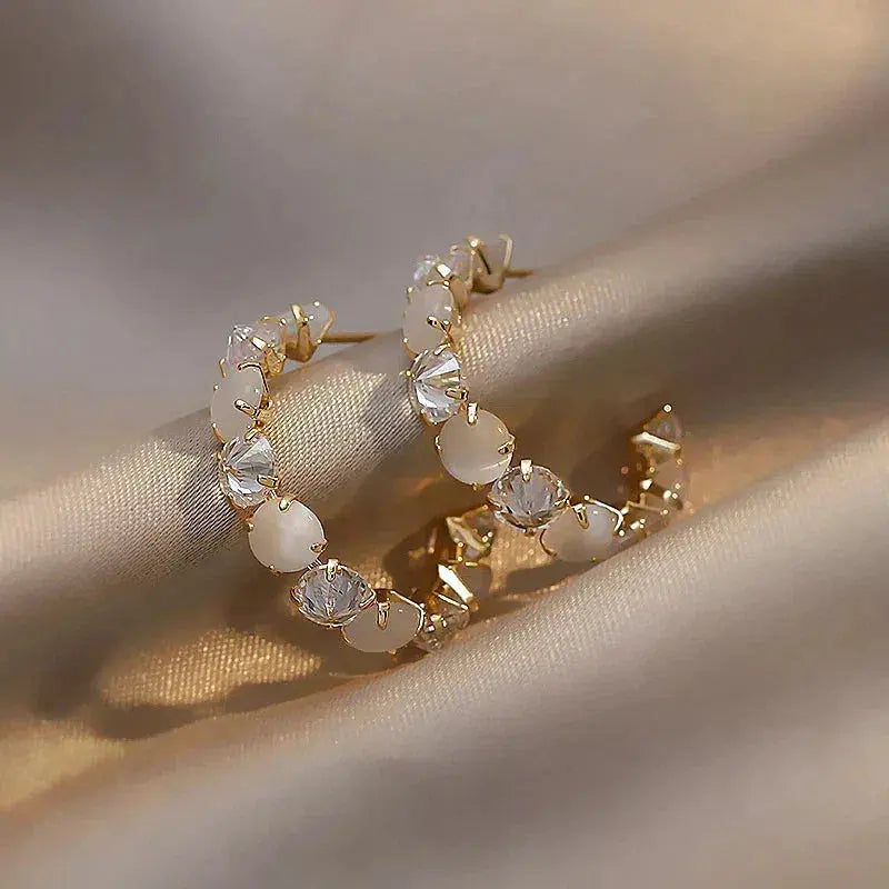 White opal with zirconia earrings in gold Unique Joyas